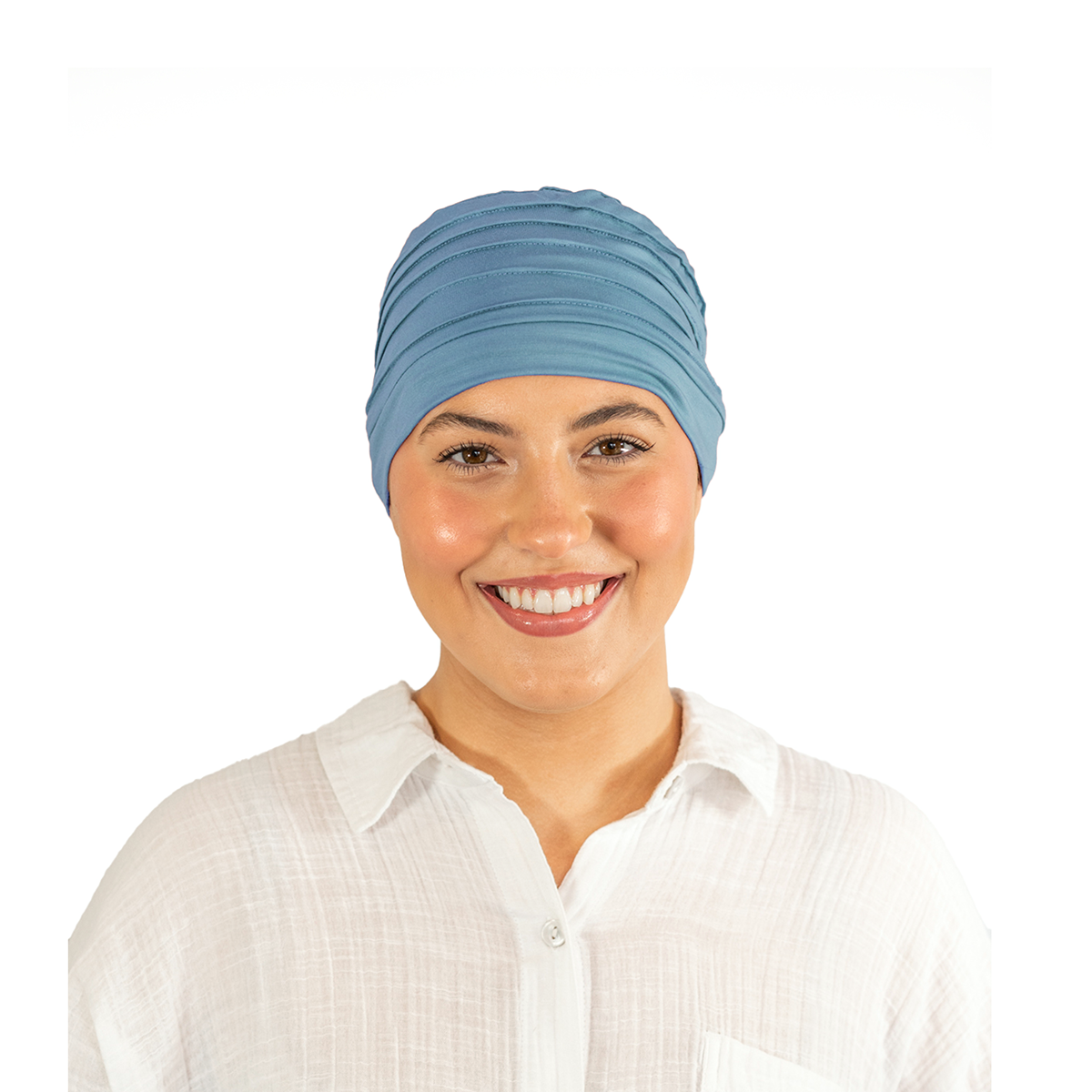 Woman wearing a blue headscarf on a white background