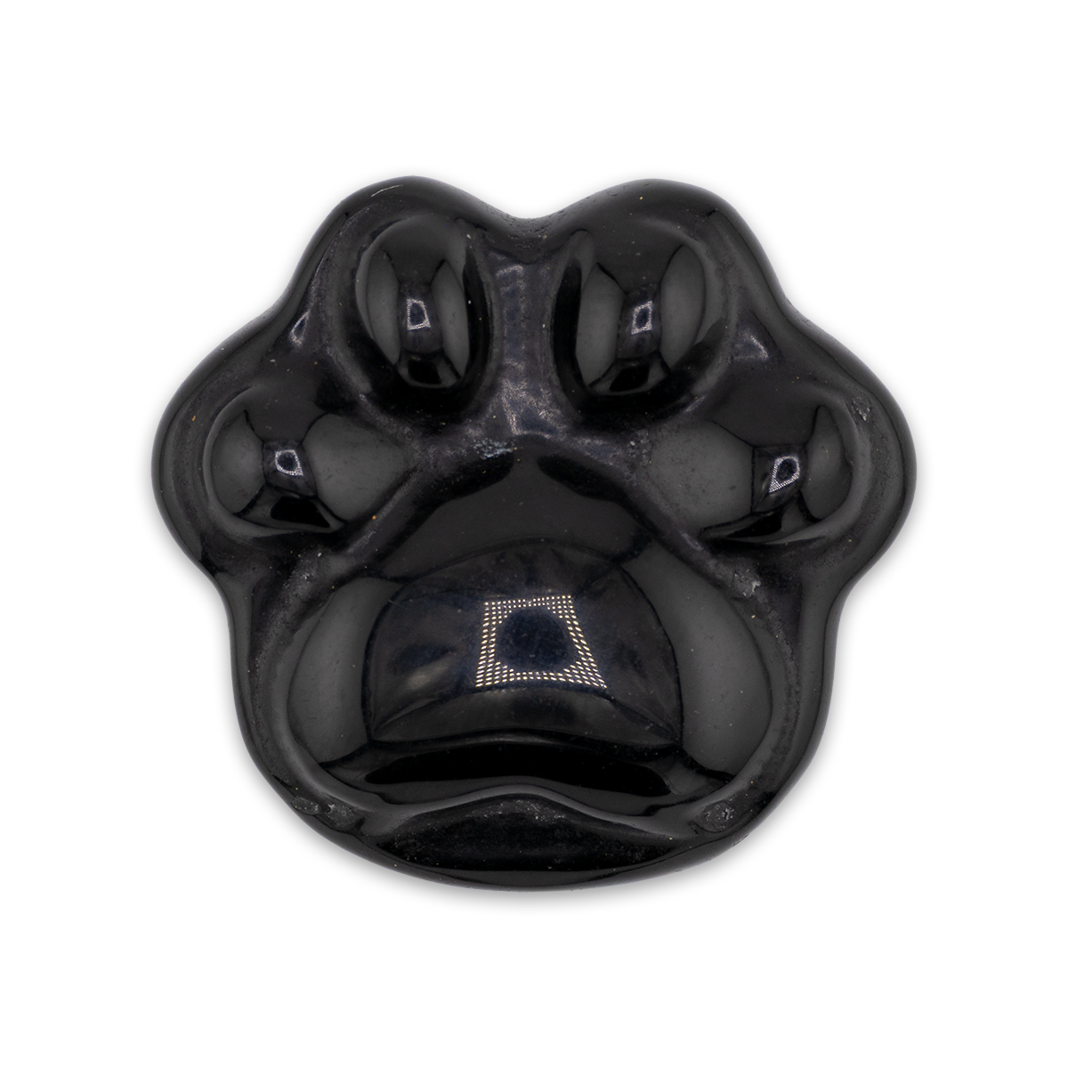 Black paw-shaped object with a central diamond-like feature on a white background