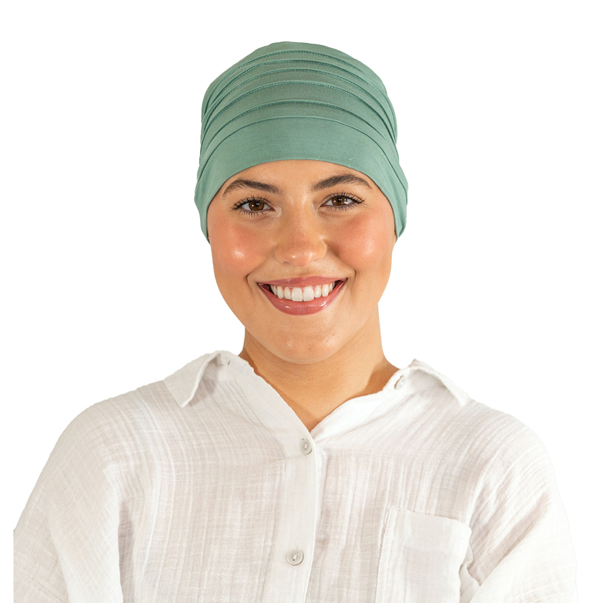Woman wearing a green headscarf on a white background