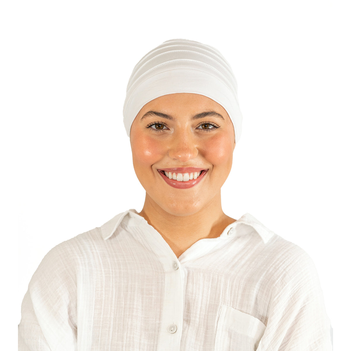 Woman wearing a white headscarf and shirt on a white background