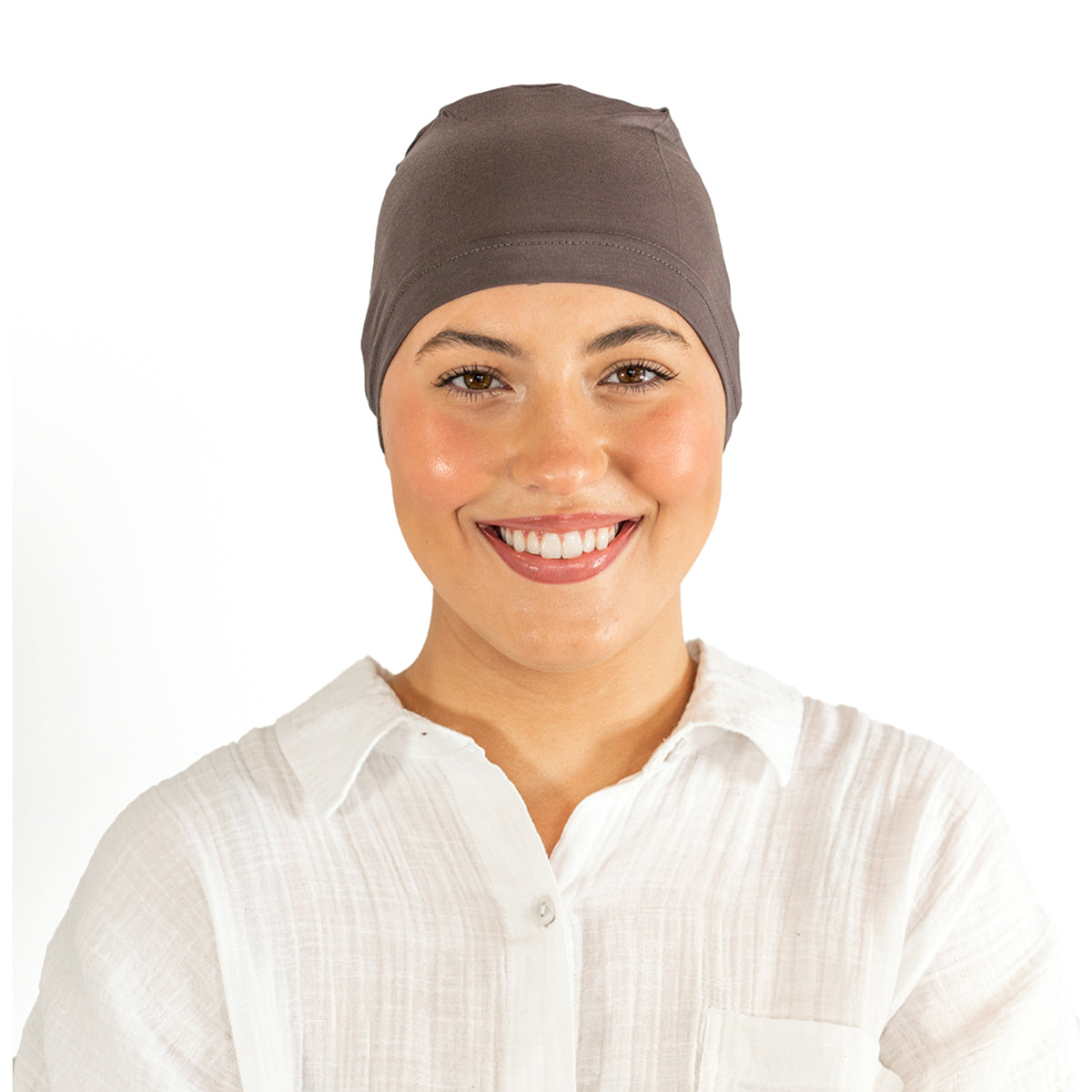 Woman wearing a brown headscarf on a white background