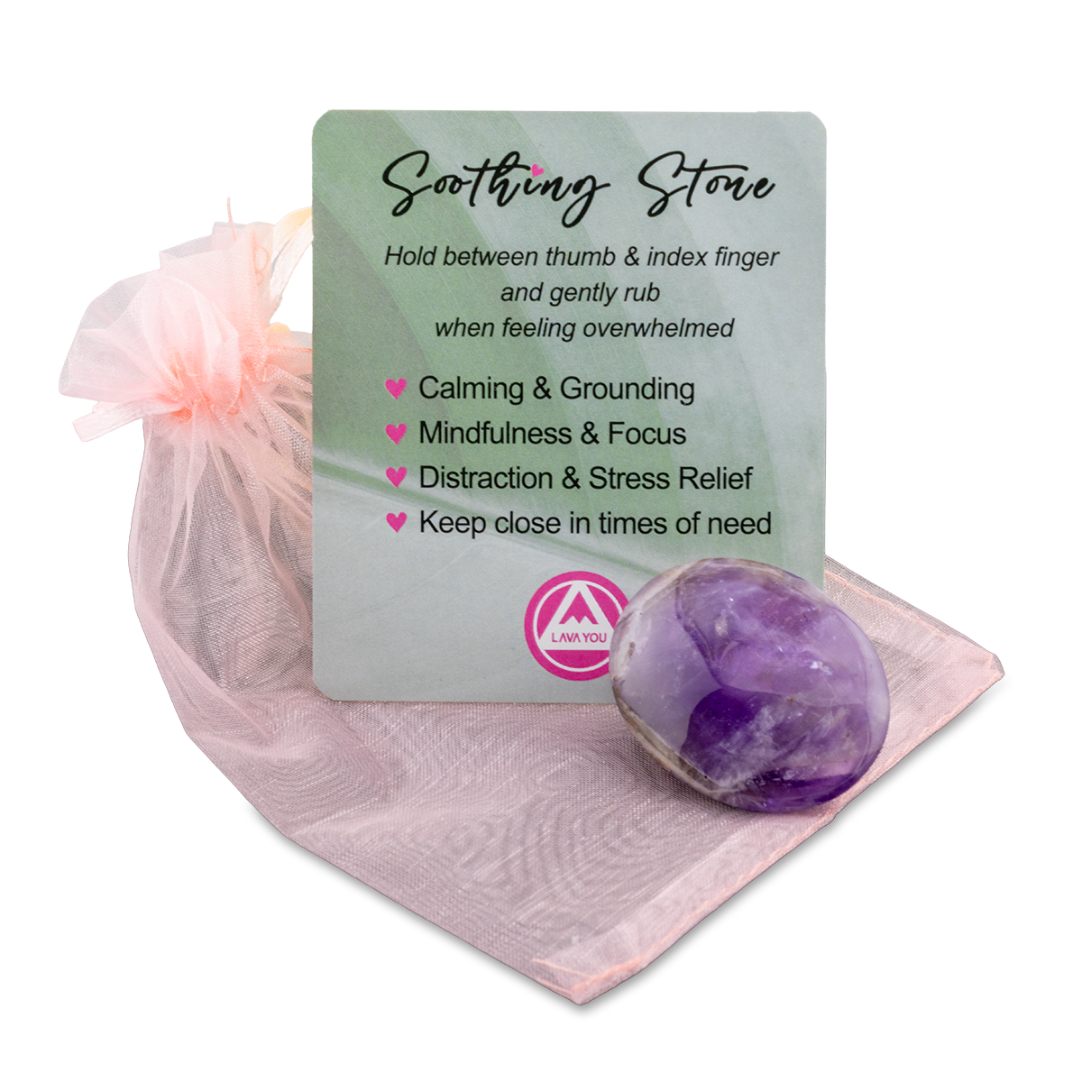 Amethyst stone with a card on a pink fabric background