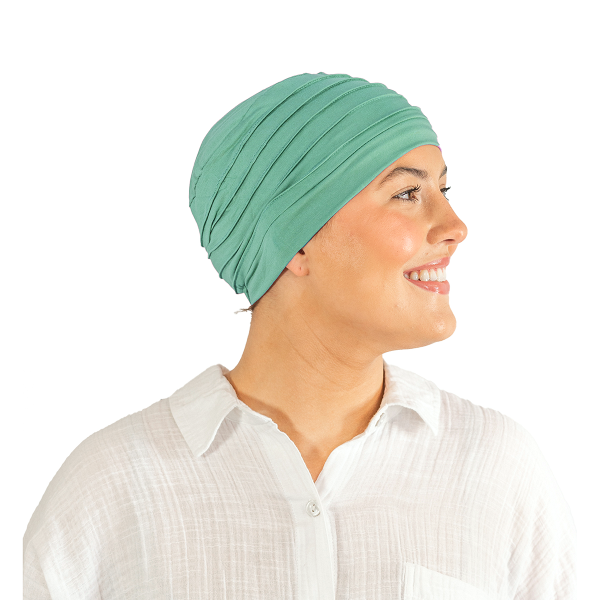 Woman wearing a green headscarf on a white background