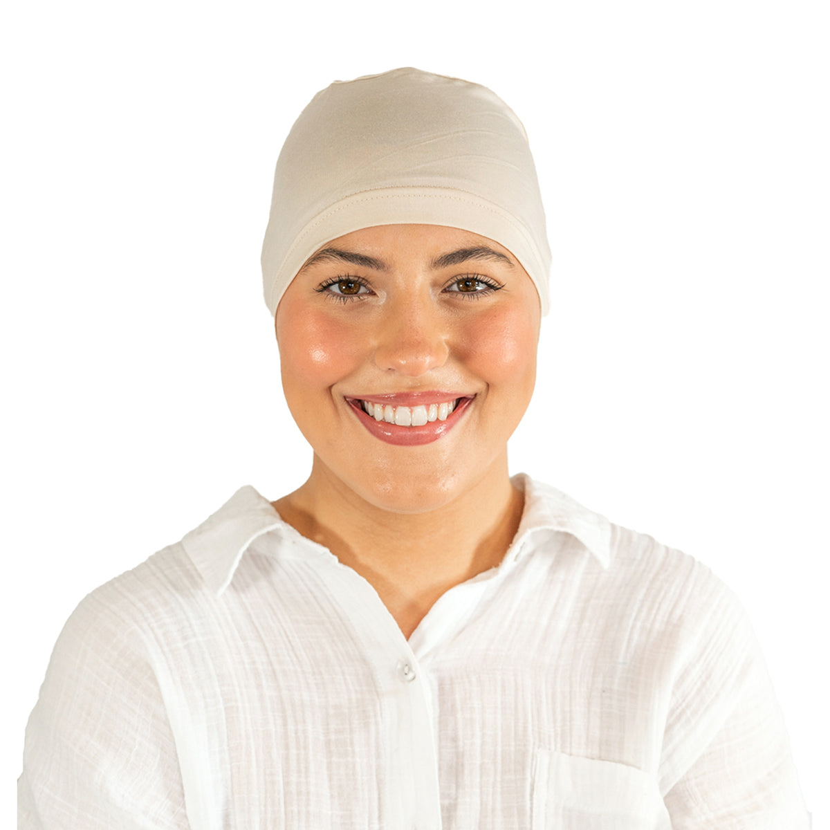 Woman wearing a beige headscarf on a white background