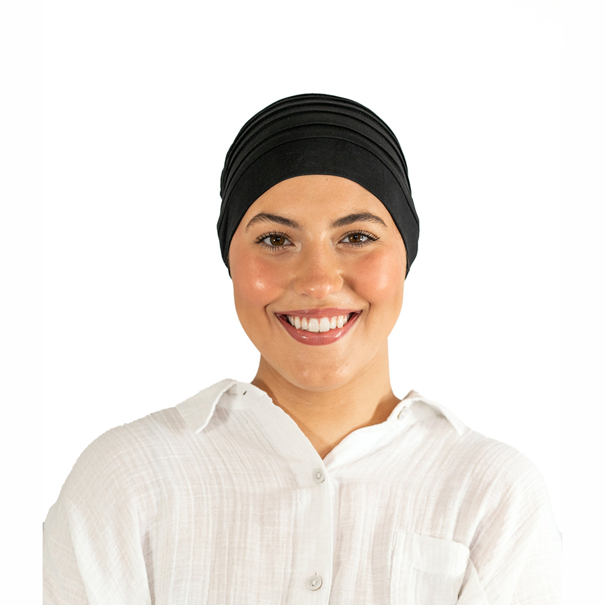 Person wearing a black headscarf and white shirt on a white background