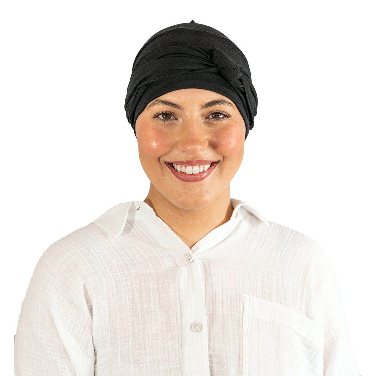 Woman wearing a black headscarf and white shirt on a white background