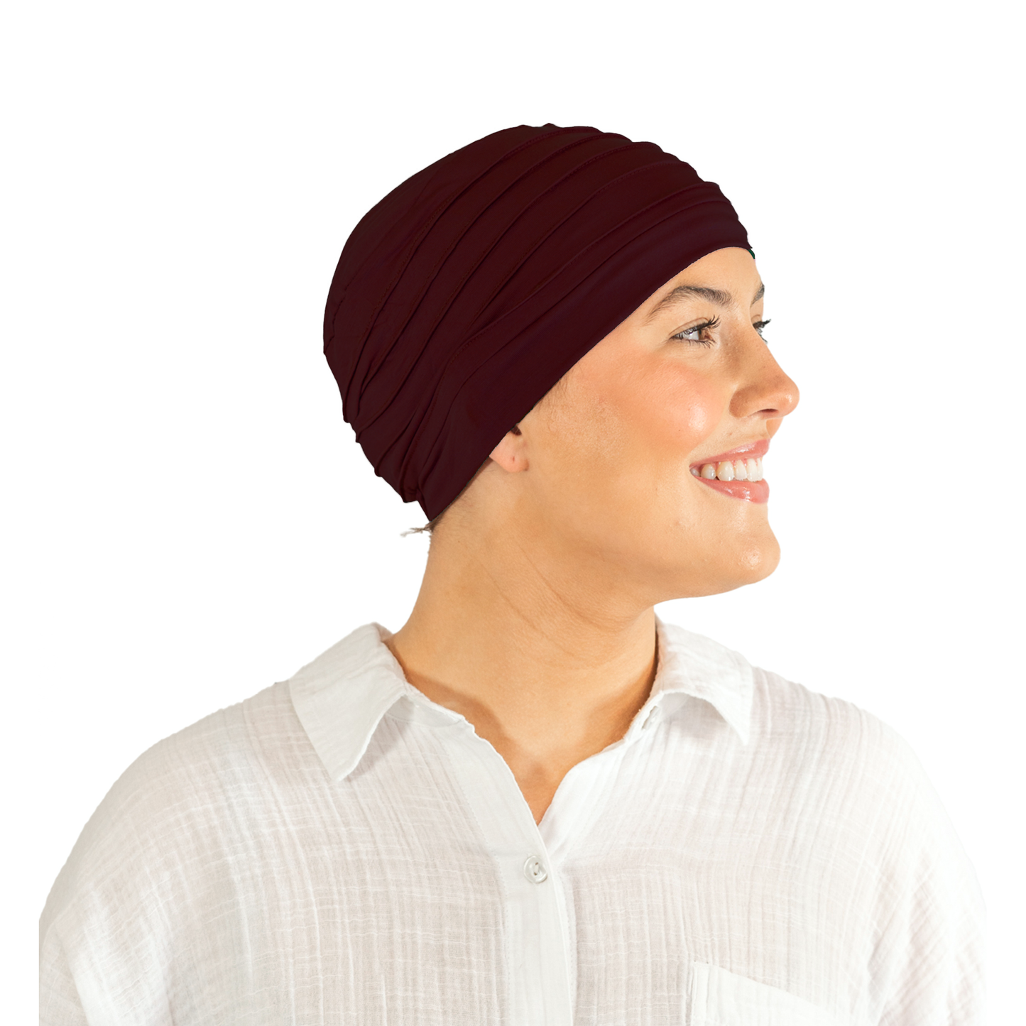 Woman wearing a maroon headscarf on a white background