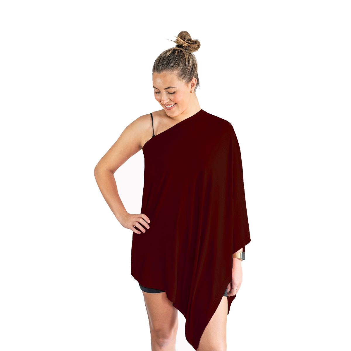 Woman wearing a burgundy one-shoulder dress on a white background