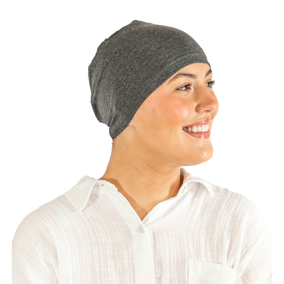 Person wearing a gray headscarf on a white background