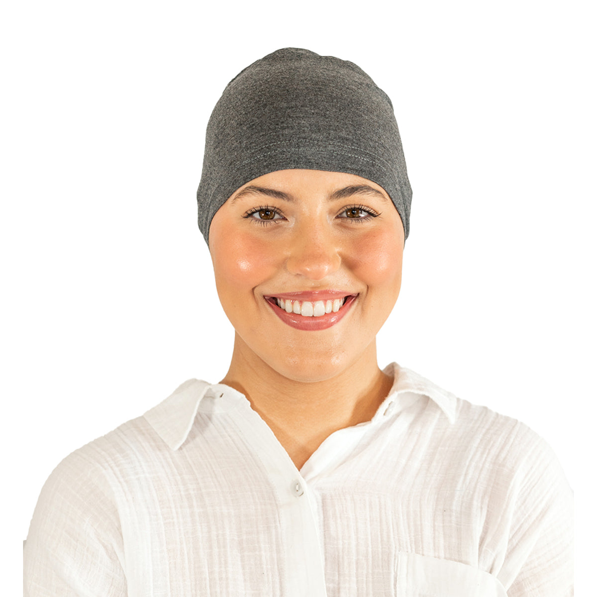 Woman wearing a gray beanie on a white background