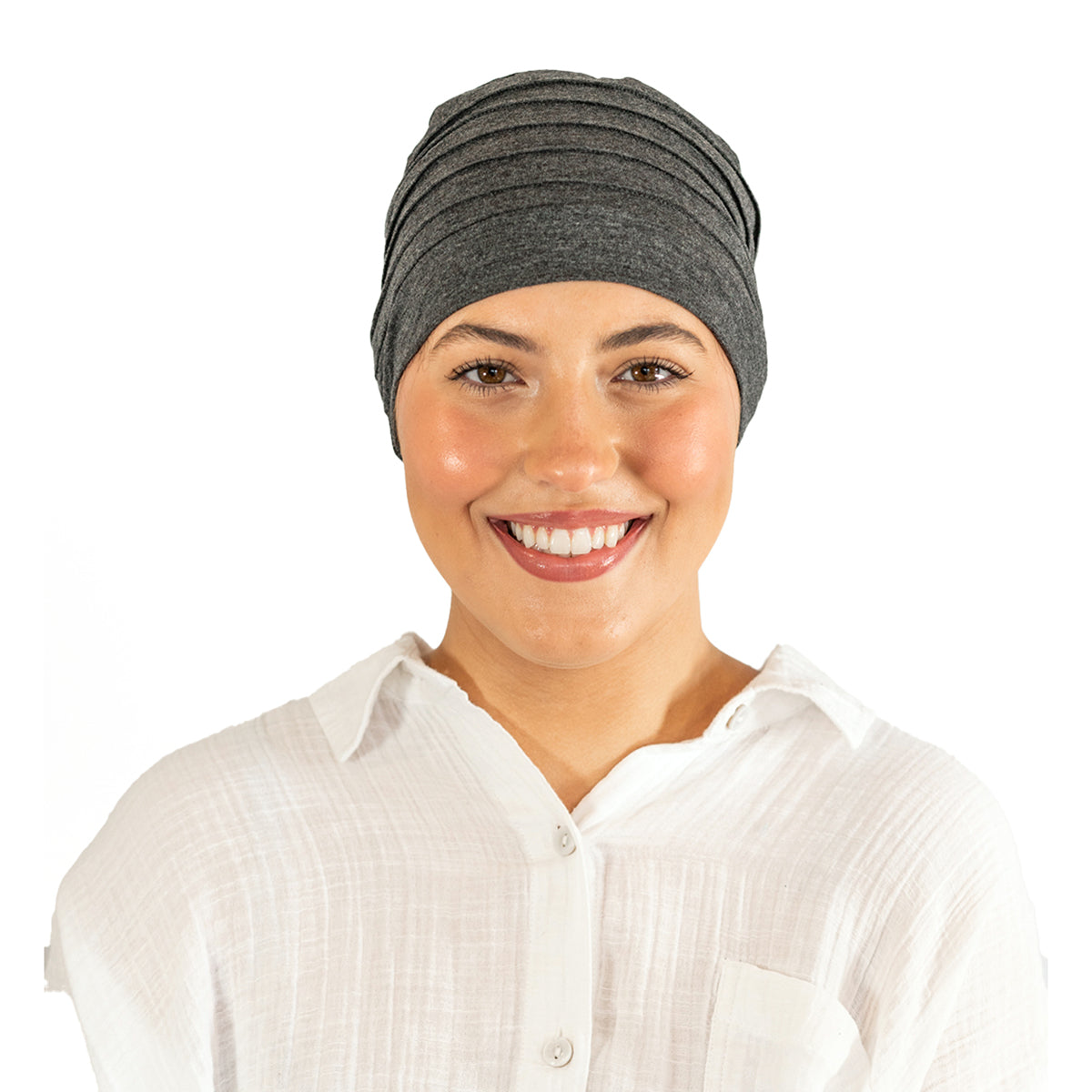 Woman wearing a gray headscarf on a white background