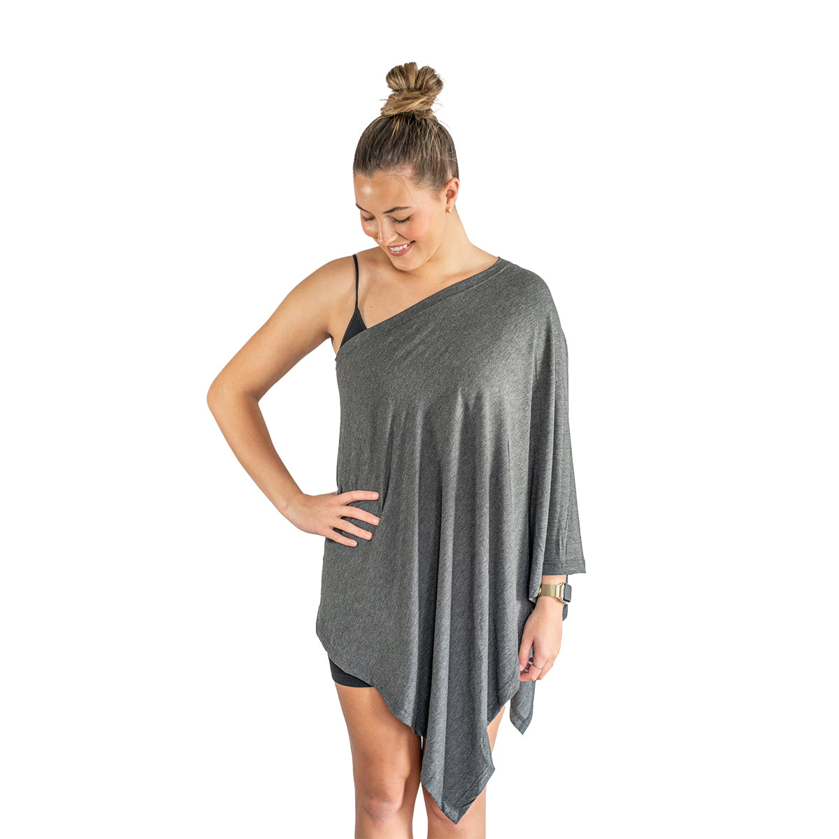 Woman wearing a gray one-shoulder dress on a white background