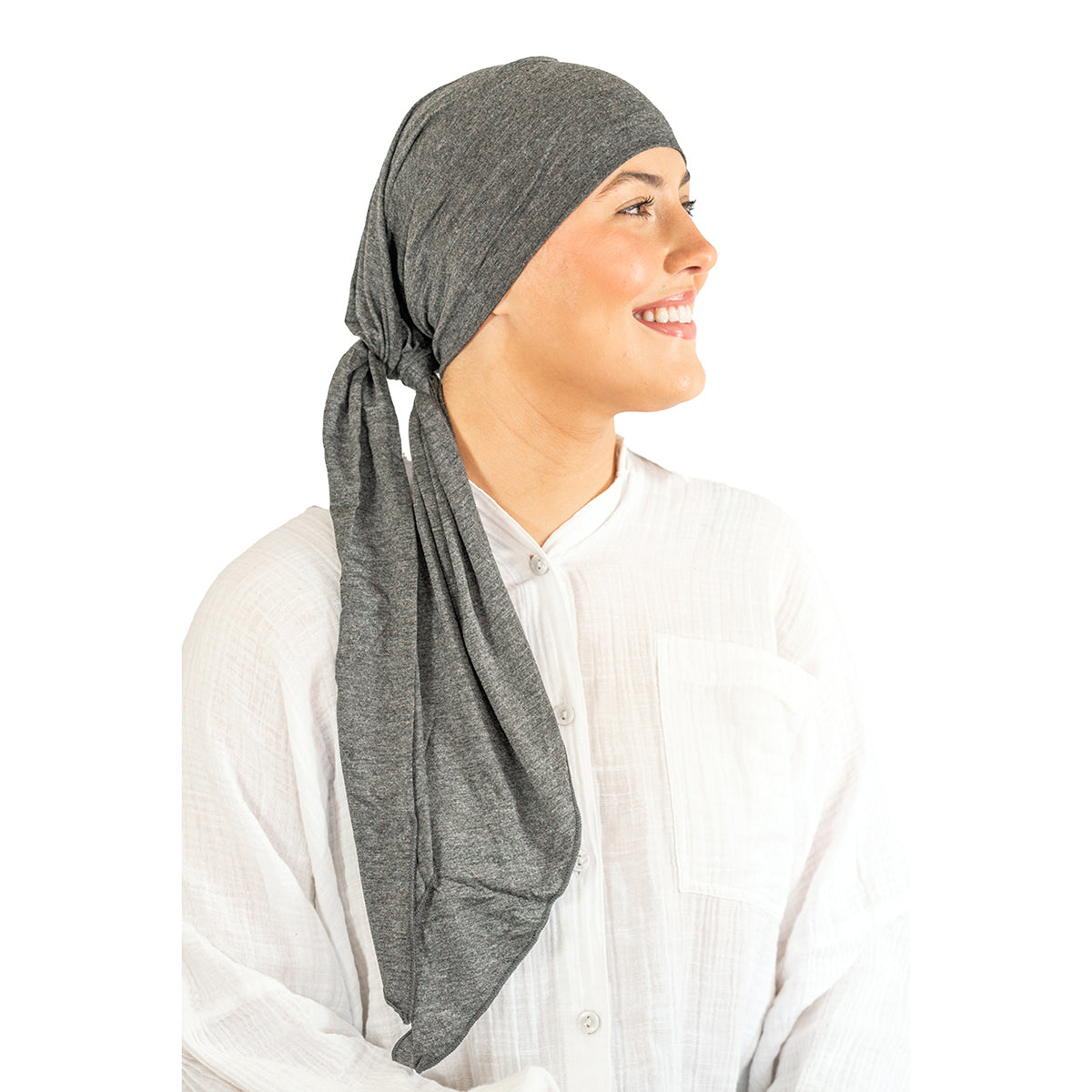 Woman wearing a gray headscarf on a white background