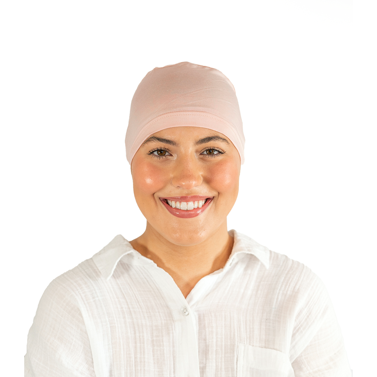 Woman wearing a pink headscarf on a white background