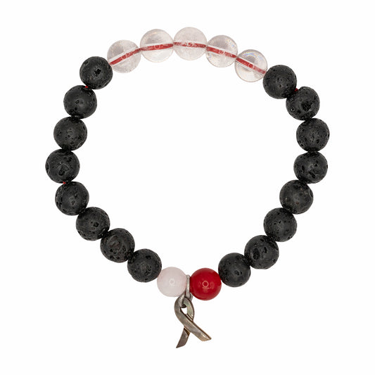 Black beaded bracelet with a red and silver ribbon charm on a white background