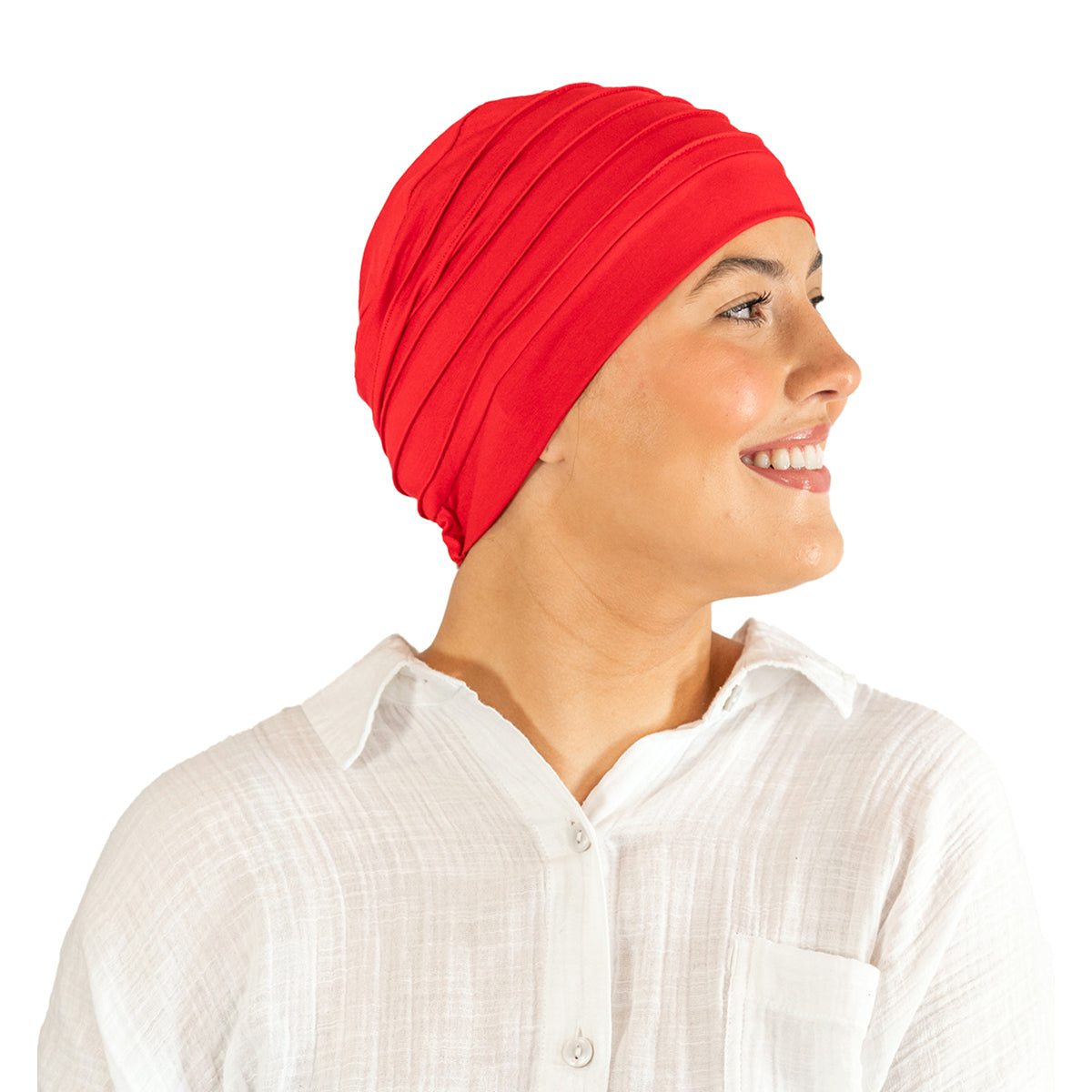 Person wearing a red headscarf and white shirt on a white background