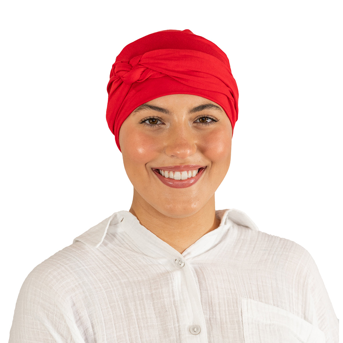Person wearing a red headscarf and white shirt on a white background