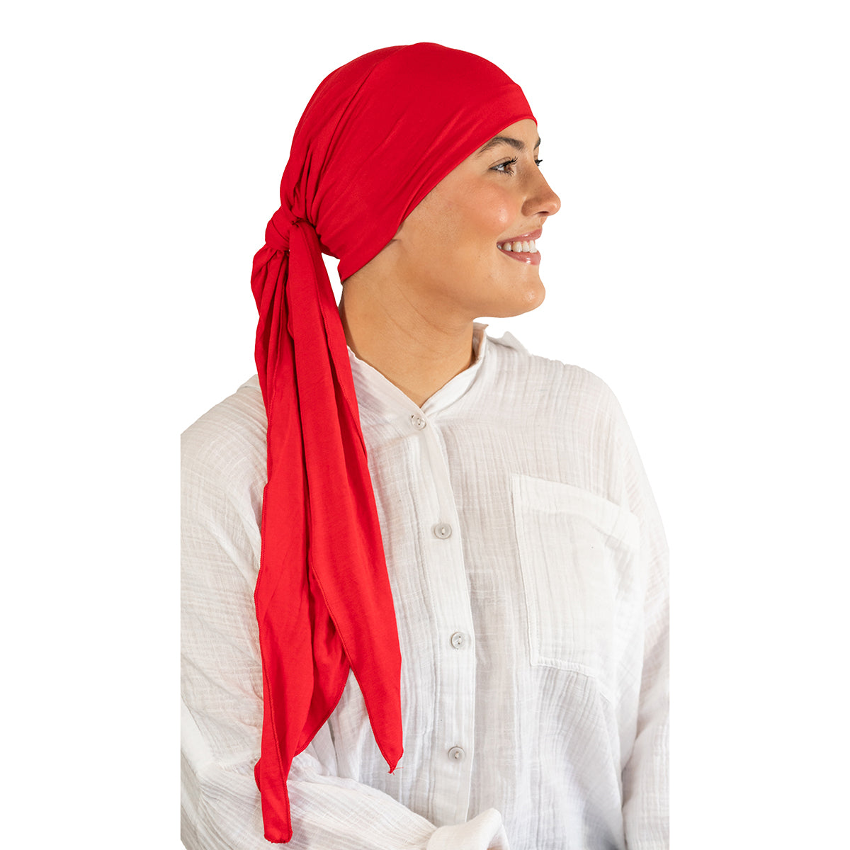 Person wearing a red headscarf on a white background
