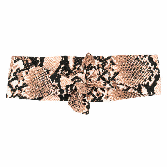 Snake print headband with a bow on a white background