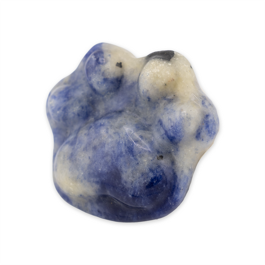 Blue and white stone sculpture of a bear on a white background