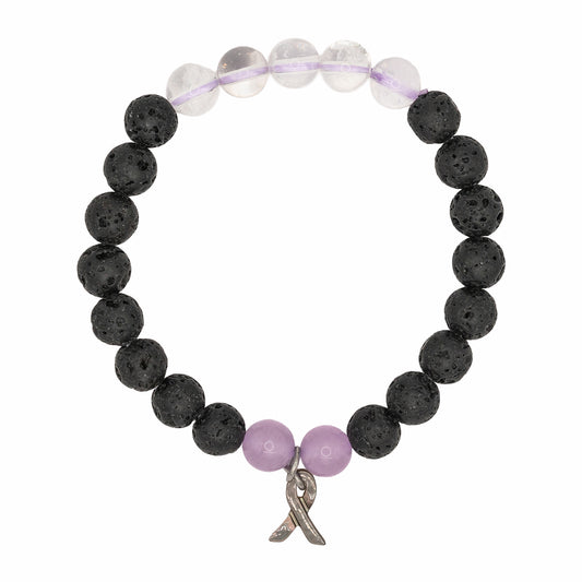 Bracelet with black and clear beads and a pink ribbon charm on a white background