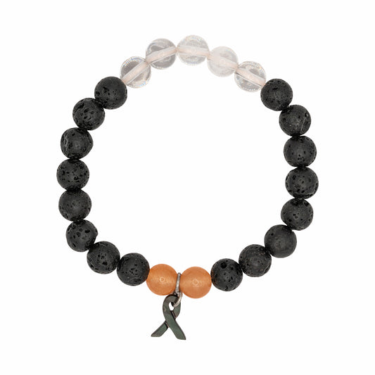 Bracelet with black beads, a brown bead, and a silver ribbon charm on a white background