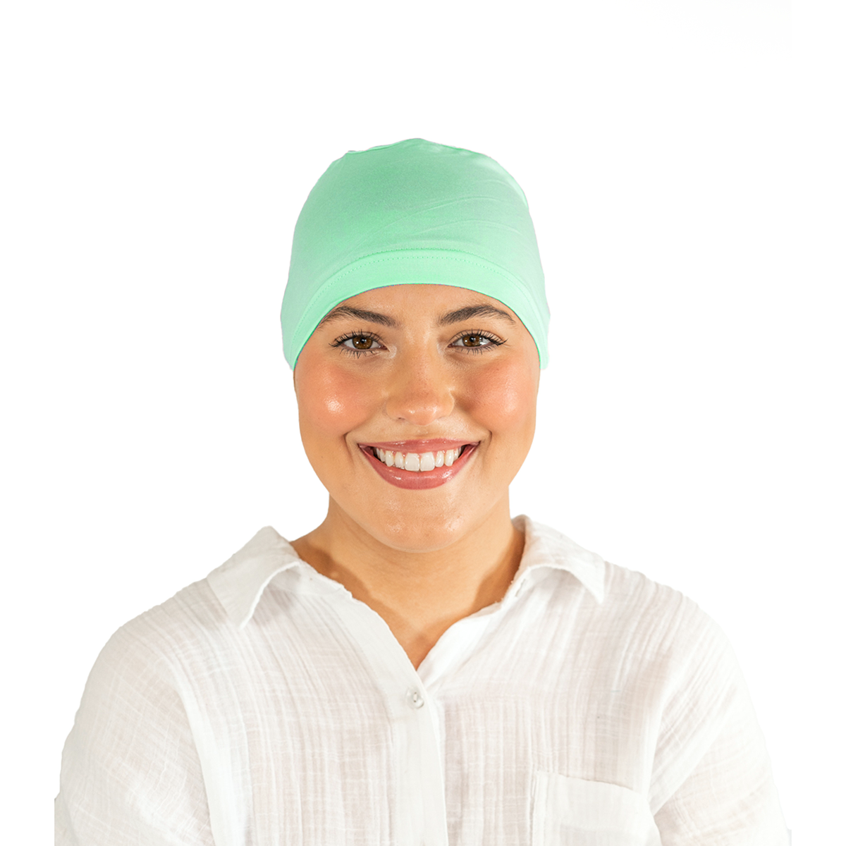 Woman wearing a light blue headscarf on a white background