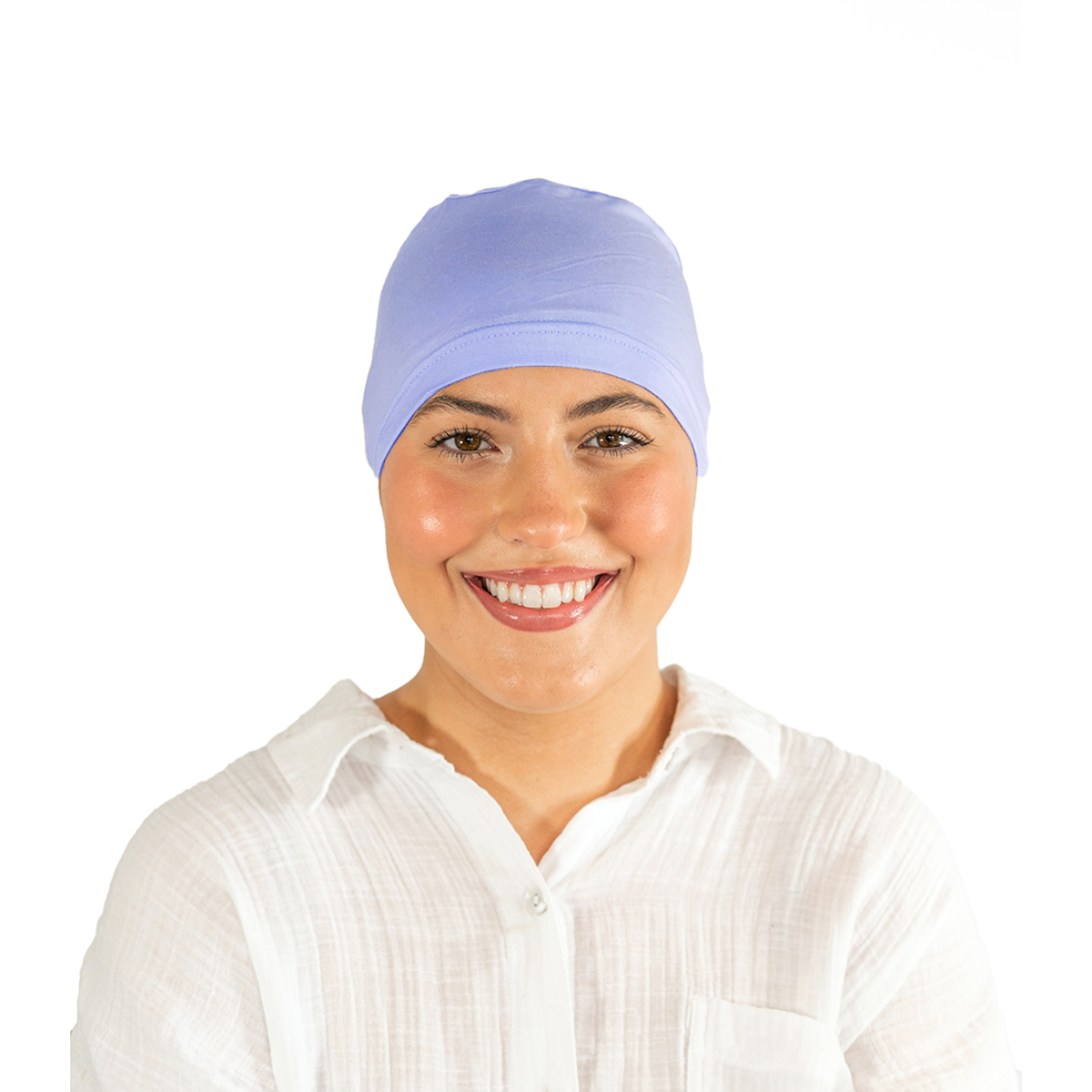 Woman wearing a light purple head covering on a white background